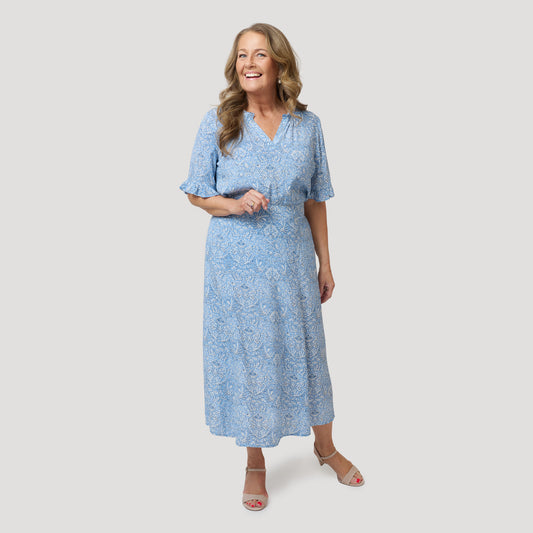 Blåblommigt set med blus och kjol